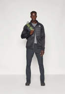 Picture of Giacca Reaxion Hybrid Nera da Uomo The North Face